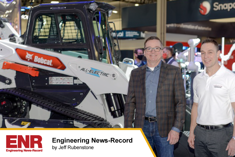 Sideview of Bobcat with Moog Components and Employees at expo for Engineering News-Record post
