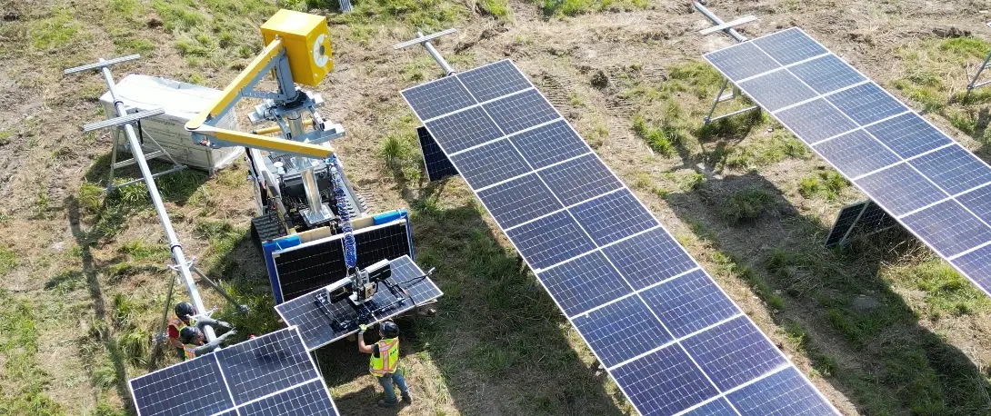 crewmate_inField_2 CrewMate lifting solar panels on a job site