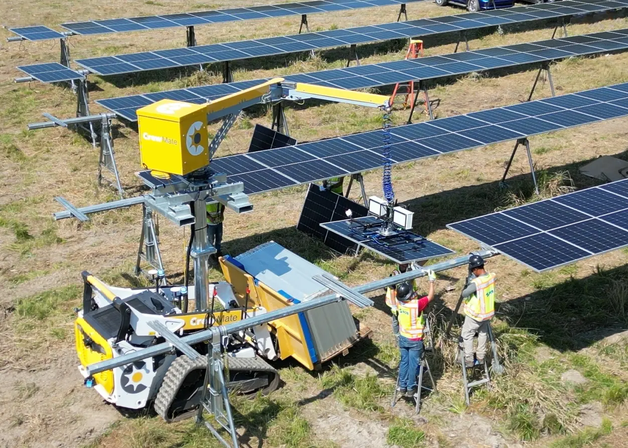 crewmate_intheworks Crewmate being used in a field with workers laying Solar Panels
